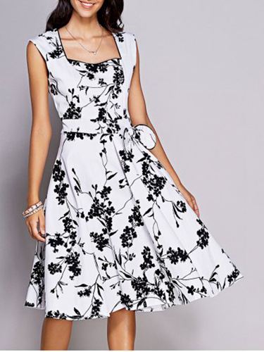Zwarte jurk met witte bloemen